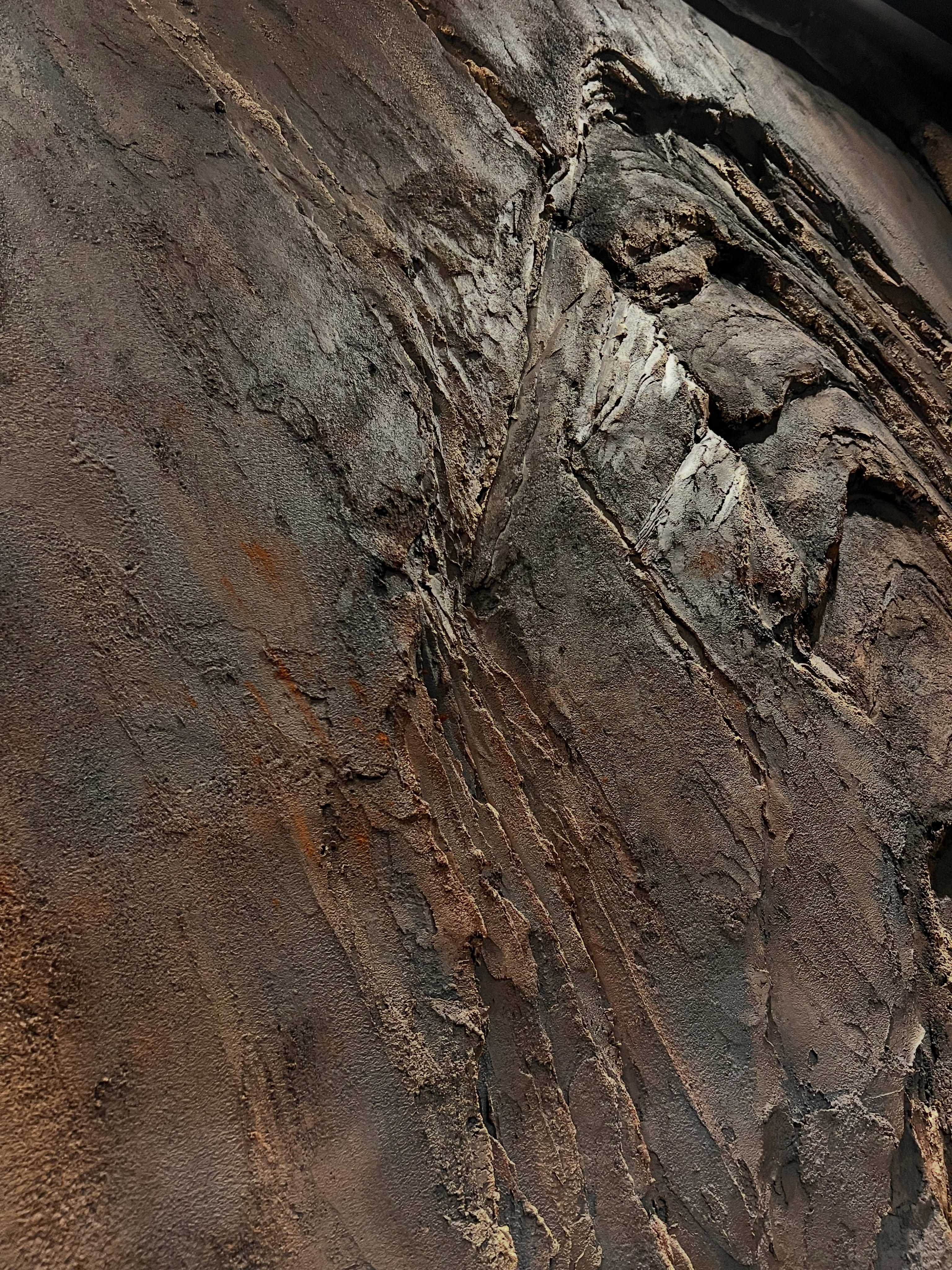 Close-up of textured stone surface with natural striations