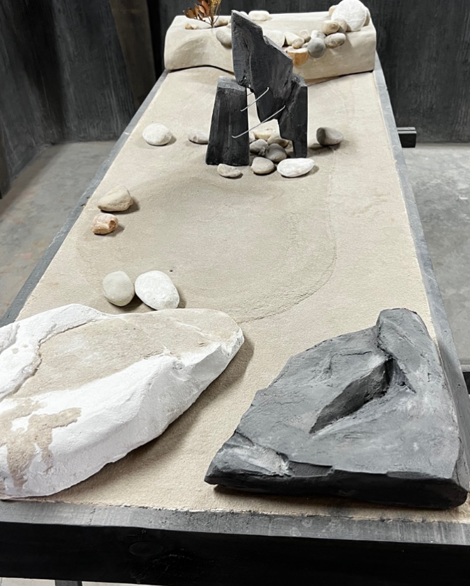 Sand garden with rocks and decorative elements