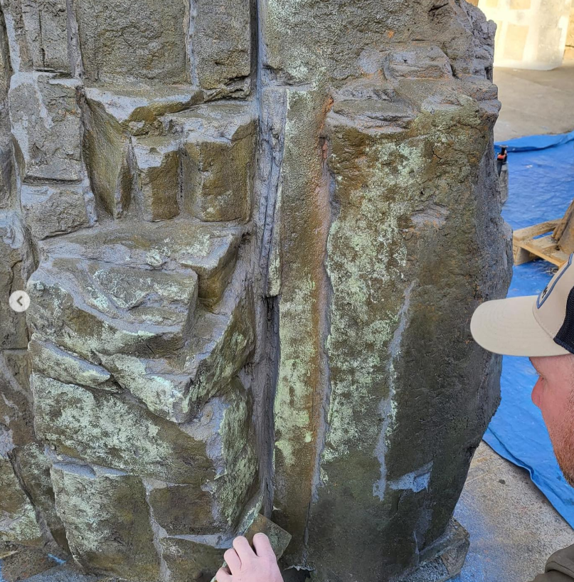 Weathered stone masonry with lichen crafted by RockCraft